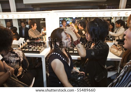 BANGKOK, THAILAND - MAY 11: cosmetic company AMWAY sponsors a makeup course with its products in the central world center and assists woman in using products , May 11, 2009 in Bangkok, Thailand
