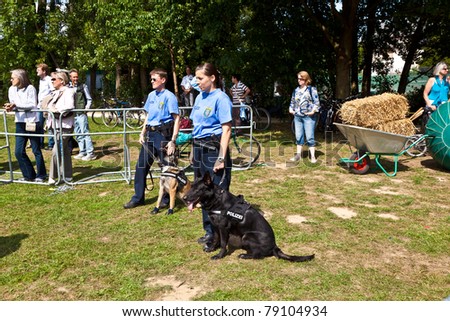 OBERURSEL, GERMANY - JUNE 12: police dogs show discipline at the Hessentag on June 12, 2011 in Oberursel, Germany. Hessentag is a big festival to present a city in the county of Hesse in Germany.