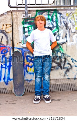 boy resting with skate board at the skate park