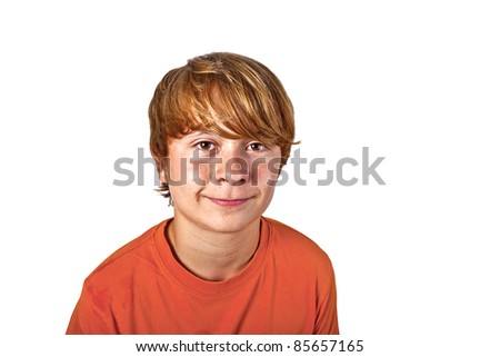 portrait of cute smiling boy with orange shirt