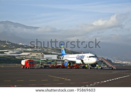 GRAN CANARIA, SPAIN - JANUARY 4: A condor flight boarding at the airport on January 4, 2010 in Gran Canaria, Spain. Nearly 2 Million passenger use the airport yearly. It is the 25th busiest in Europe.