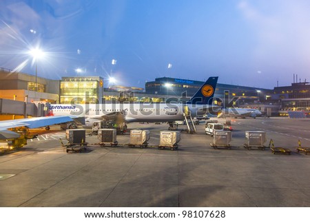FRANKFURT, GERMANY - MARCH 16: Lufthansa Flight at the gate for morning flight on August, 25, 2011 in Frankfurt, Germany. New Terminal A is under construction for airport enlargement.