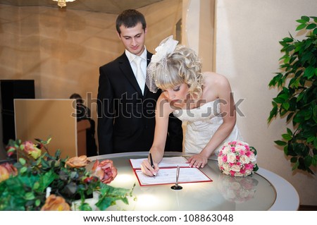 Bride and groom. Wedding ceremony. bouquet of flowers. marriage certificate