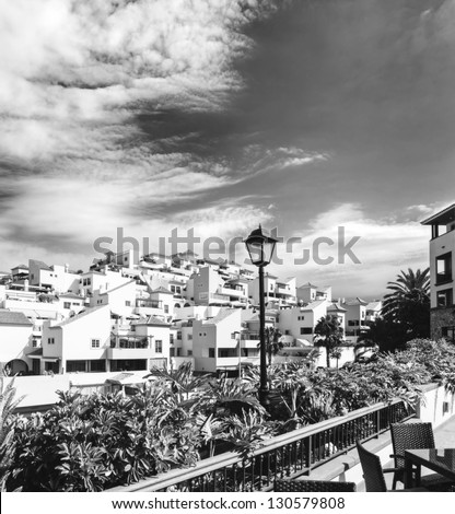 Sunset in Tenerife island, Spain. Tourist hotel Resort. Vintage black and white