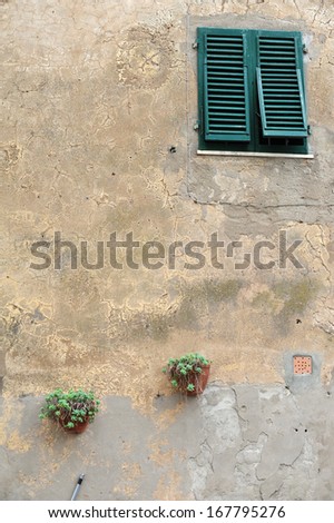 Picturesque nook of Tuscany. typical italian nook in tuscan village, Italy, Europe. view of Houses with garden / Old European Houses in the street, Italy.