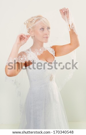 beautiful bride isolated on white background. Portrait of beautiful bride. Wedding dress.