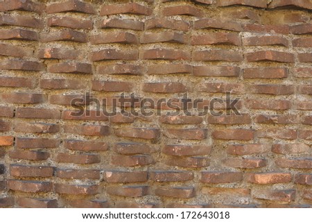 Old brick wall in a background image. City wall in the Italian city Roma. Old Bricks Wall Pattern. ancient antique architecture of Italy