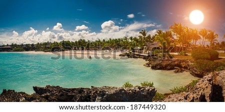 Panorama of Tropical beach, ocean and sky. beautiful beach and tropical Caribbean sea. Vocation and travel in Dominican Republic, Seychelles, Caribbean, Bahamas. Relaxing on remote Paradise beach.
