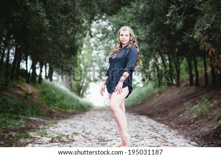 Fat girl outdoor. Portrait of young fat woman in park. attractive overweight woman walking outdoor. Rural