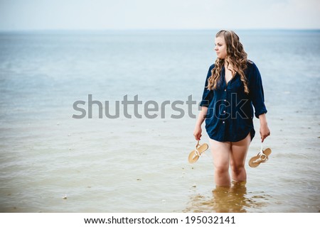 Fat girl outdoor. Portrait of young fat woman in park. attractive overweight woman walking outdoor.