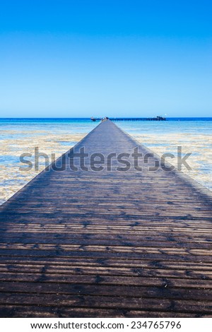 Pontoon bridge at red sea. Beach at a luxury typical unrecognizable 5 star hotel in Egypt, Africa. Holiday resort in Egypt. sharm el sheikh. hurgada.