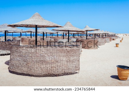 Beach at a luxury typical unrecognizable 5 star hotel in Egypt, Africa. Holiday resort in Egypt.