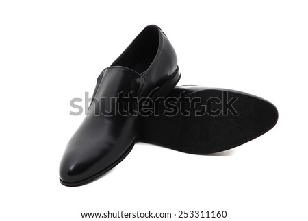 Black patent leather men shoes against white background. Male fashion with shoes on white.  The black man\'s shoes isolated on white background.