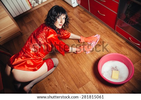 Sexy housewife washes floor in the kitchen, similar available in my portfolio