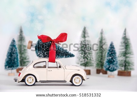 Little car with christmas tree
