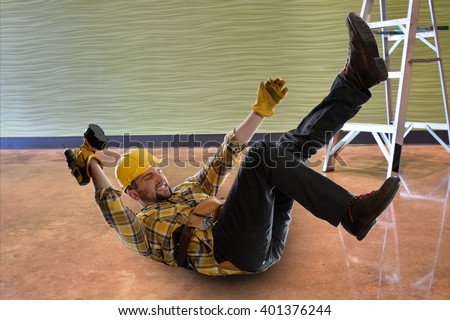 Worker embraces himself as he falls off of ladder.