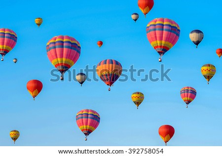Colorful hot air balloons in blue sky