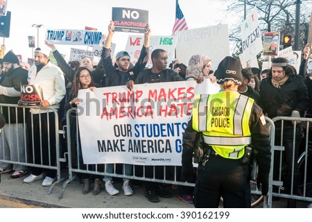 Chicago, ILLINOIS - MARCH 11, 2016: Protesters demonstrate against hate-speech outside the Donald Trump rally at the University of Illinois at Chicago Pavilion.