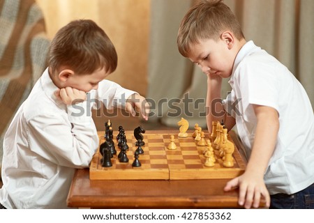 Two boy playing chess