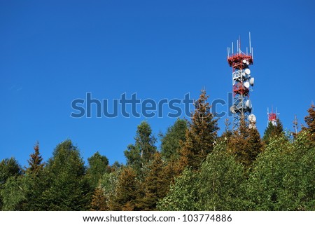 Radio antenna communication tower on the top of a mountain, Italy