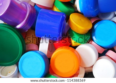 Colorful plastic bottle caps for recycling as a background