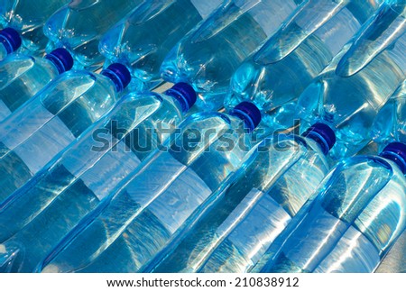 Plastic bottles with carbonated mineral water. Soda Bottles.