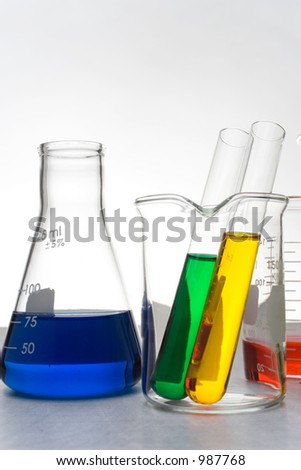 Glass beakers filled with colored liquid