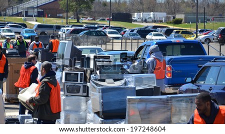 ANN ARBOR, MI - APRIL 26: Workers stack electronic equipment at an electronic recycling event in Ann Arbor, MI April 26, 2014.