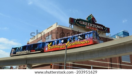 DETROIT, MI - JULY 6: The Detroit People Mover going past the Greektown casino in Detroit, MI on July 6, 2014.