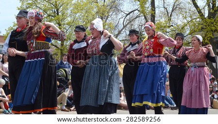 HOLLAND, MI - MAY 3: Tulip Time Festival dancers perform a mother-daughter dance in Holland, MI May 3, 2015.
