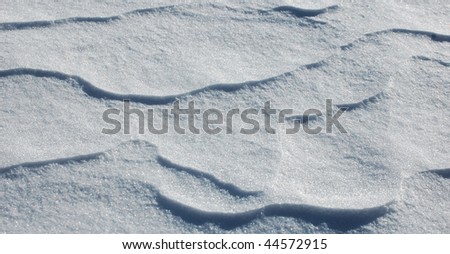 windblown snow background  white winter scene
