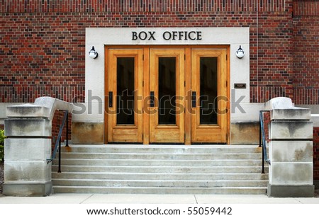 Theater box office, brick walls, three doors