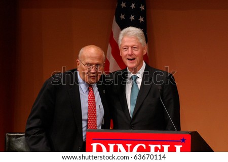 ANN ARBOR, MI - OCTOBER 24: Former President Bill Clinton and Congressman John Dingell of Michigan at a \