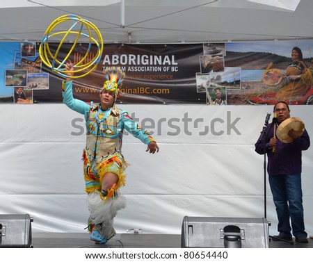 VANCOUVER, BC - JUNE 26:  World-champion Hoop Dancer Alex Wells performs at the National Aboriginal Awareness Celebration, June 26, 2011 in Vancouver, BC.