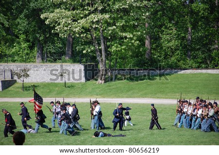 DEARBORN, MI - MAY 30: Soldiers advance during an American Civil War battle reenactment May 30, 2011 at Greenfield Villa, Dearborn, MI