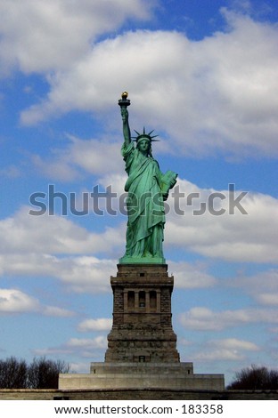 Statue of liberty against a blue sky