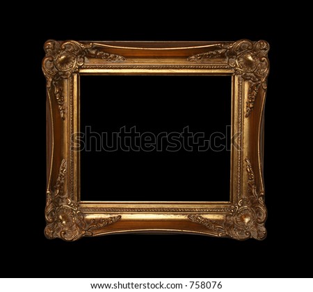 Large vintage golden frame isolated on black with clipping path for easy masking.