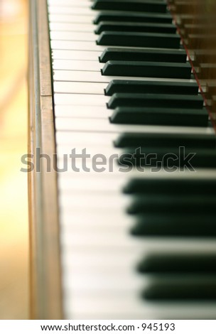Piano keys on an old piano - short depth of field