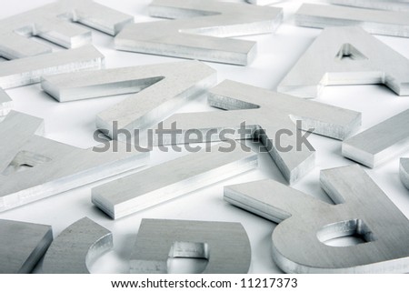 Stylish letters cut out of polished steel