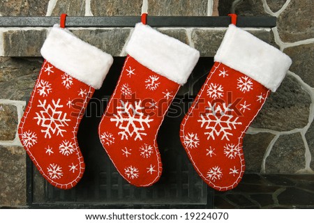 Christmas stockings on a fireplace mantel