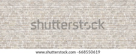 Vintage whitewashed brick wall panoramic background texture. Home and office design backdrop in modern style