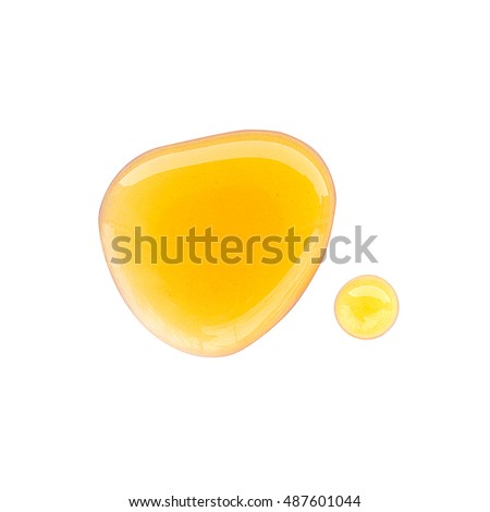 Drop of honey isolated on white background