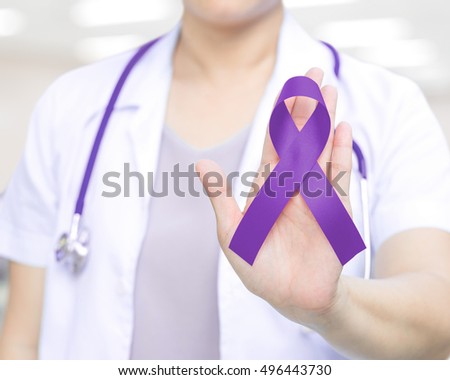 Female doctor in white uniform with purple awareness ribbon in hand for ADD,ADHD,Alzheimer\'s Disease awareness,Arnold Chiari Malformation,Childhood Hemiplegia & stroke,Epilepsy,Chronic & Acute Pain