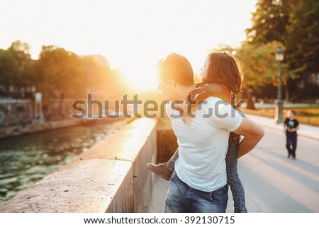 loving father with a daughter look at the river