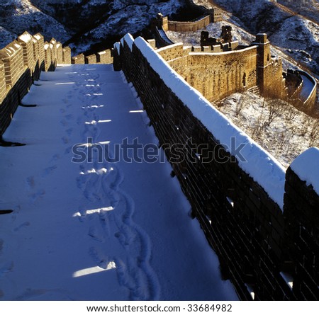 The Great Wall in winter, covered with snow.