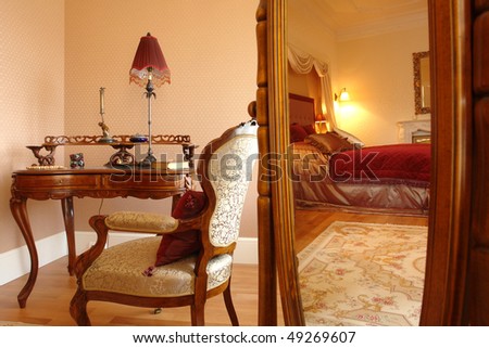 interior of a bedroom, reflection in a mirror