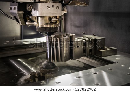 High precision mold part CNC wire cut machine cutting high precision mold parts.