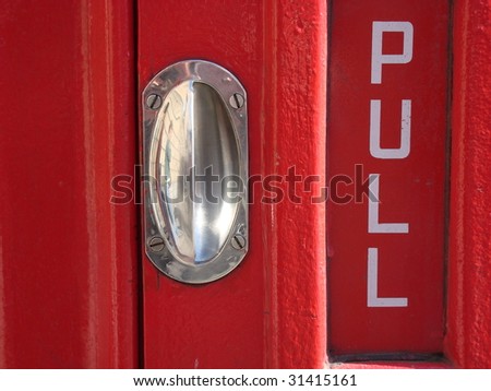 pull sign on telephone box