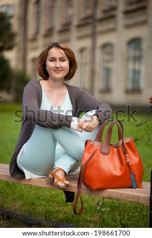 Female college student. Happy girl in european university