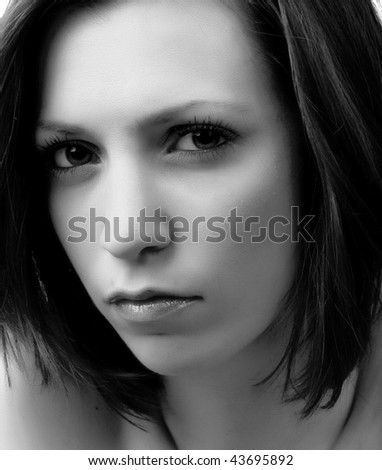 Portrait of young adult woman with health skin of face isolated on white background Black and white
